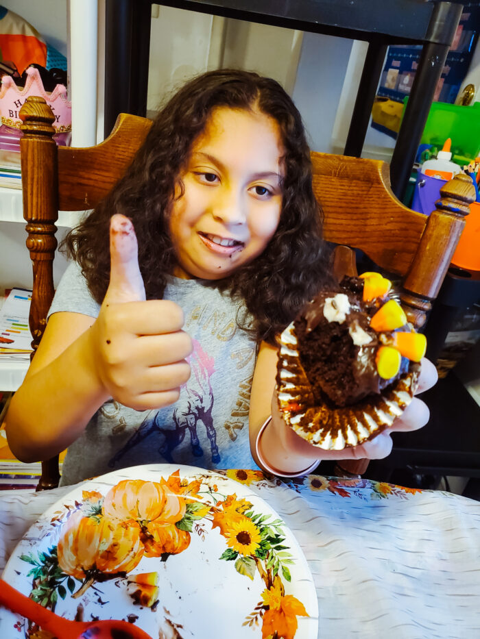 Zhen gives a thumbs up for the turkey cupcake idea we created for Thanksgiving!