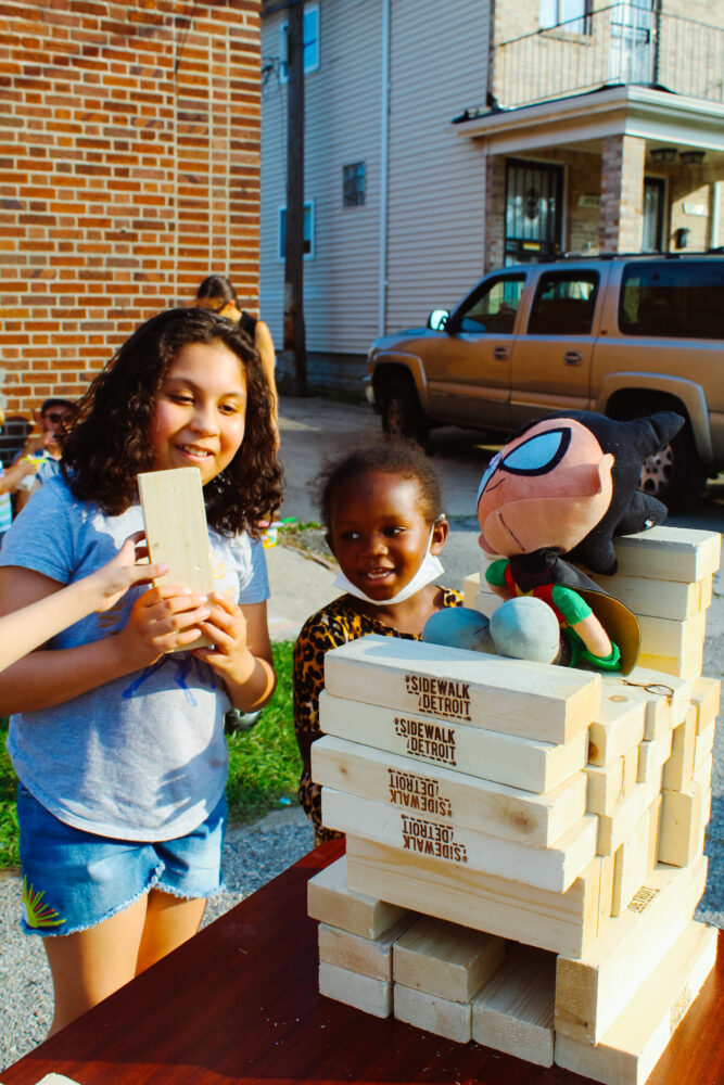 Two children play with blocks at Sidewalk Detroit's first summer festival in Detroit.